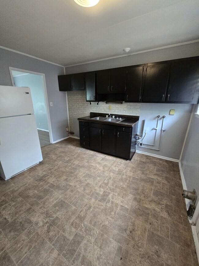 Building Photo - Two Bedroom Duplex IN Lawrence Township Located Near 56th St and Franklin Rd