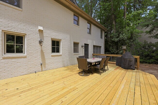 Building Photo - Stunning 5BR Inside-the-Beltline Retreat Near Crabtree & North Hills!