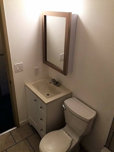 bathroom vanity - 200 SW Florence Ave