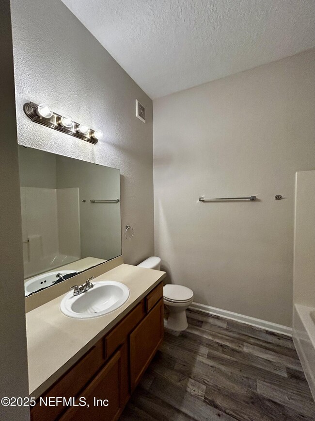 Building Photo - 6788 Manotak Oaks Dr