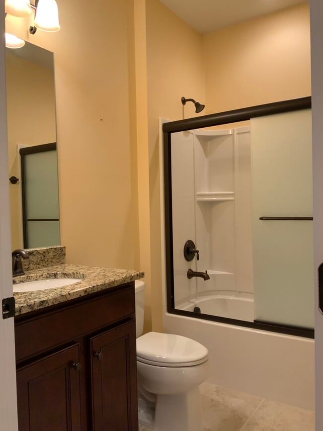Building Photo - Move in ready in a wonderful Active 55+ Ad...