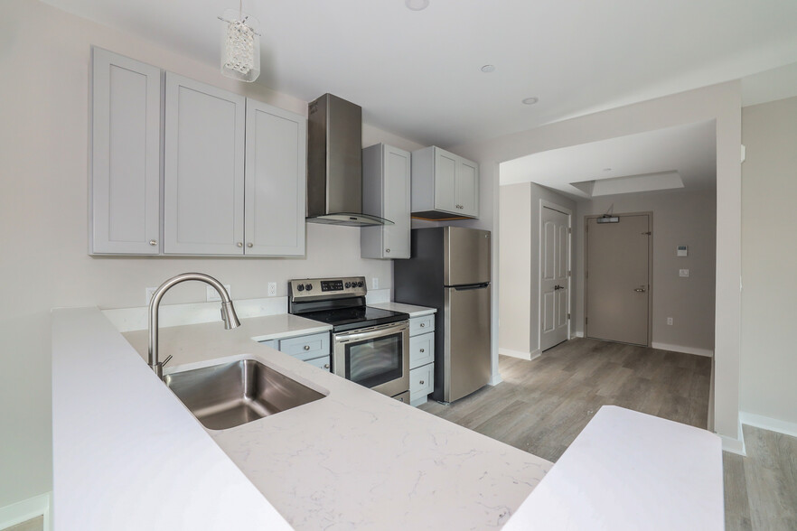 Unit 107 Kitchen - Liberty Plaza Suites