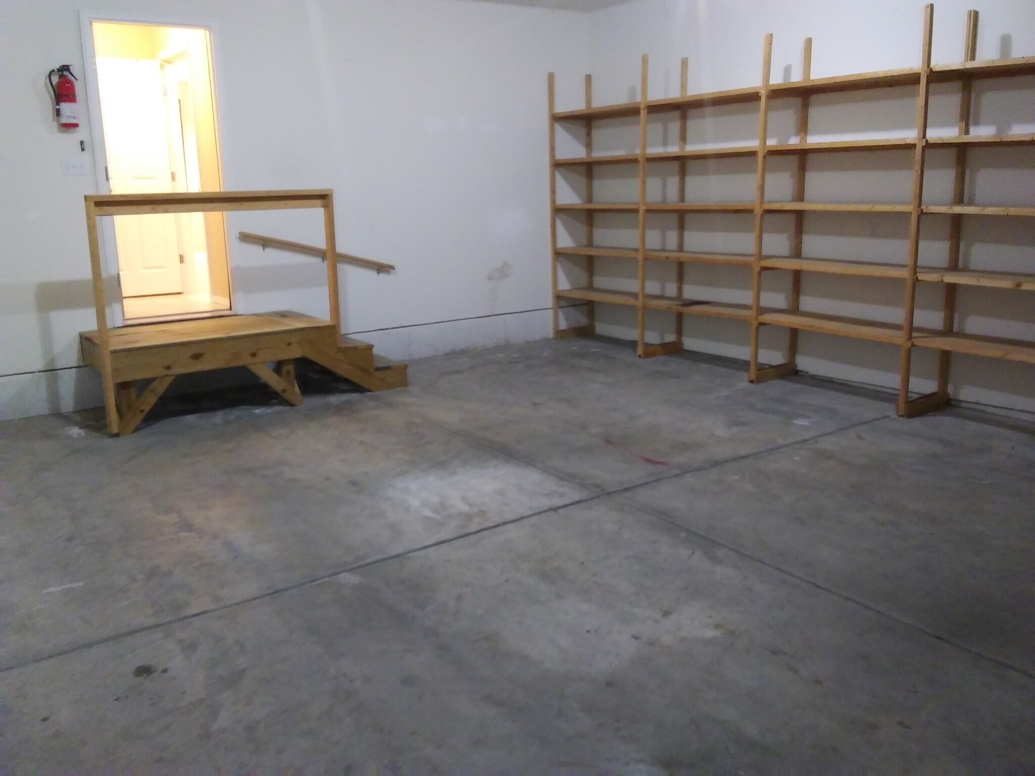 Garage with storage shelves - 3013 N Fremont Ave
