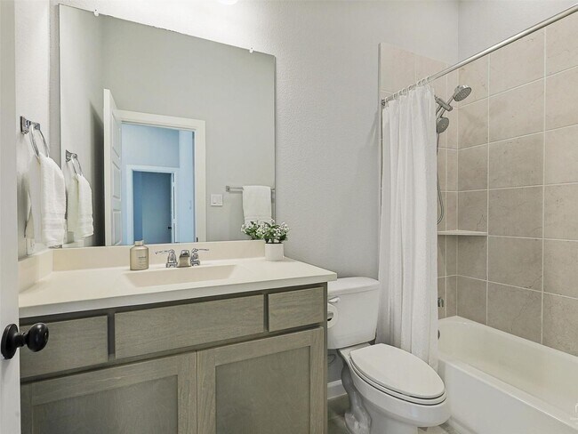 Building Photo - Upgrades galore and ready Now!