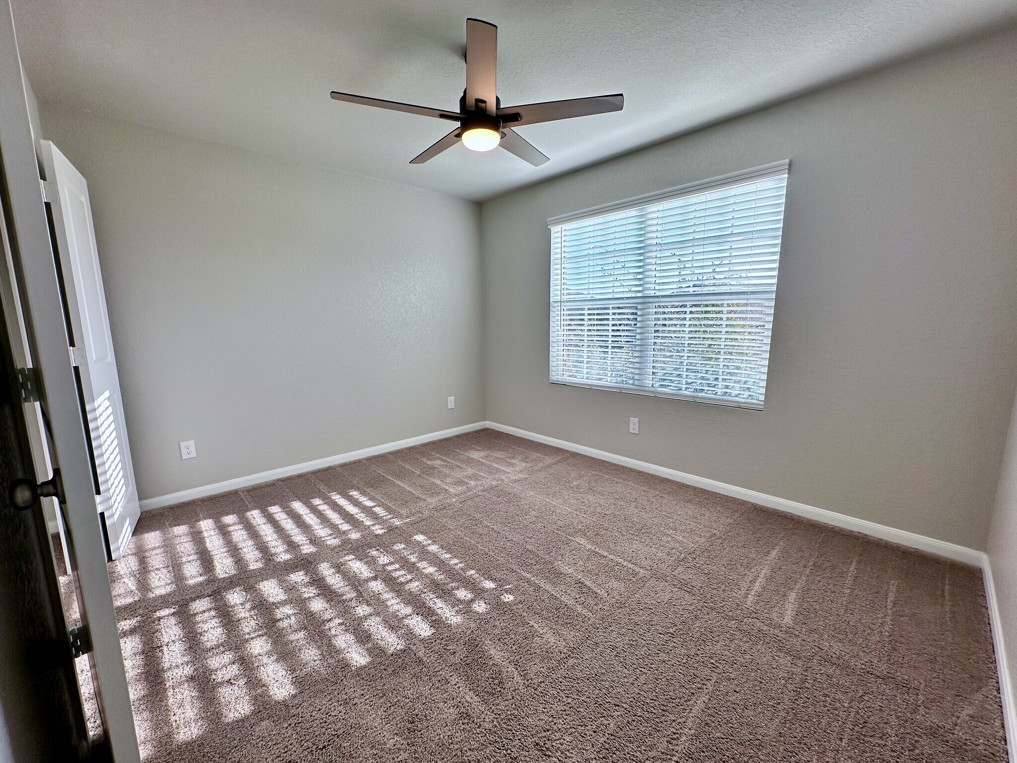 Front Bedroom on the right of house - 32132 Morels Ave