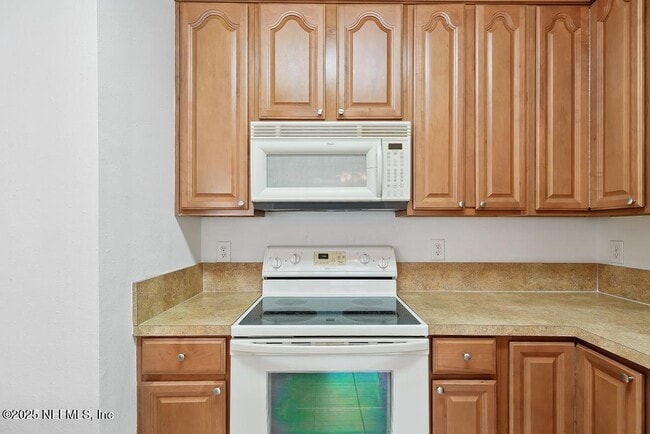 Building Photo - 7202 Deerfoot Cir