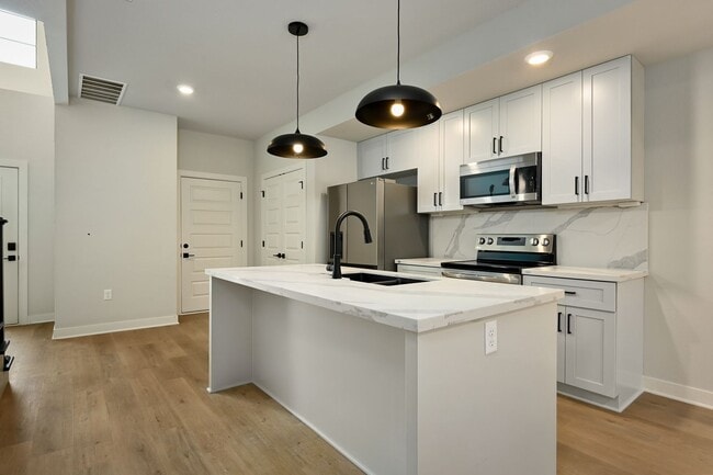 Building Photo - Two Bedroom Townhome with Unfinished Basement