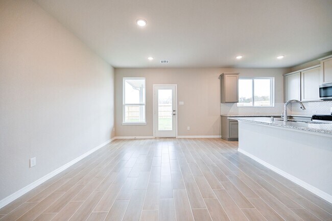 Building Photo - Brand new, contemporary 1-story home. FRID...