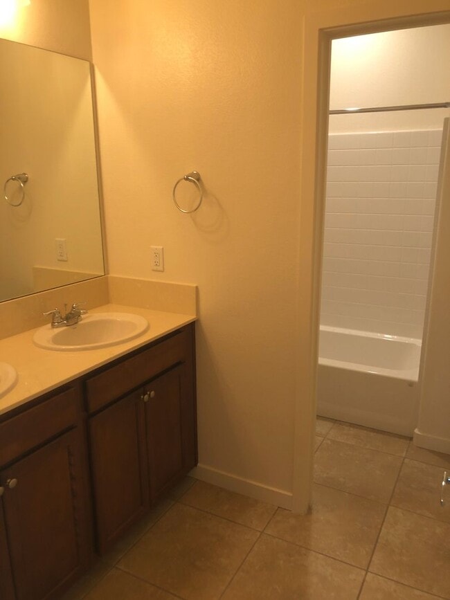 Building Photo - CORNER LOT - END UNIT - NO YARD TO MAINTAI...