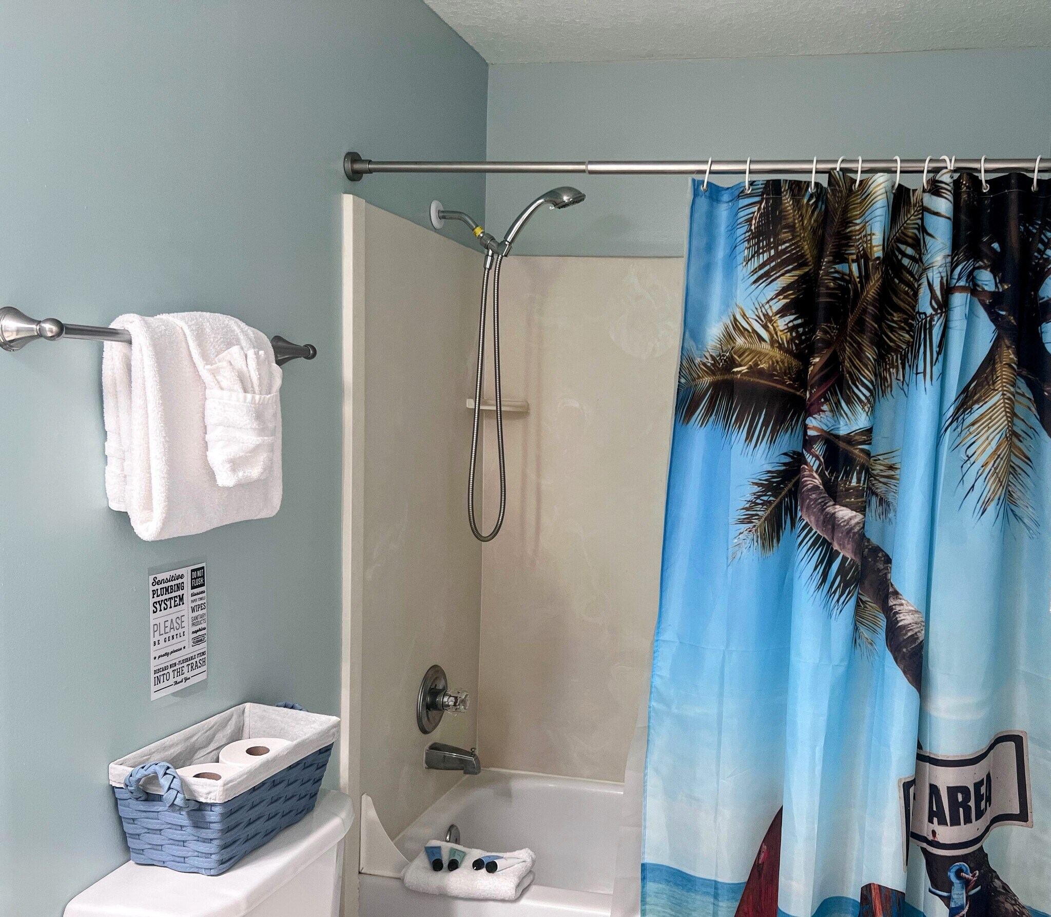 Master bathroom with a bath tub and handheld showerhead - 10625 Front Beach Rd