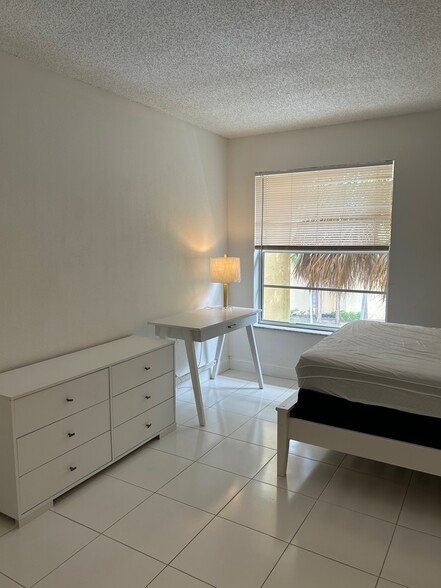 2nd bedroom with dresser, desk - 470 NW 20th St