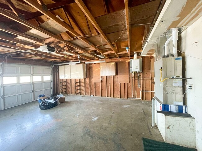 Building Photo - This gorgeous Pine Hills home has a large interior, 2-car garage, and fully-fenced yard!