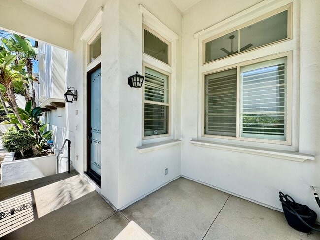 Building Photo - Beautifully Remodel Townhouse with AC & Two Car Garage!