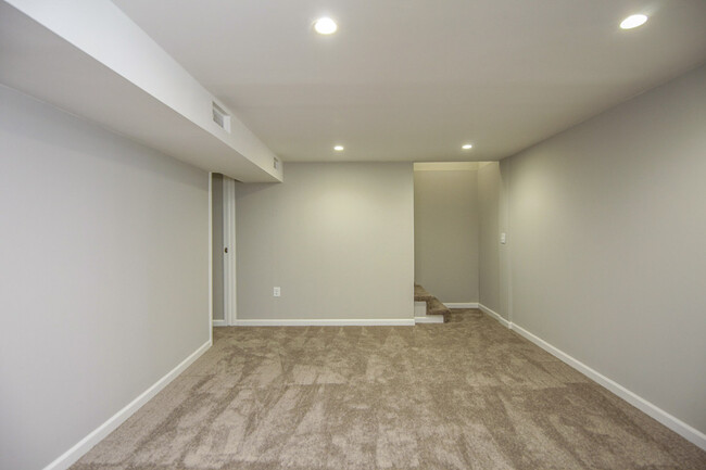 Photo 17. Lower level can be used as a second living room, family room, or game room - 1623 Lethia Dr