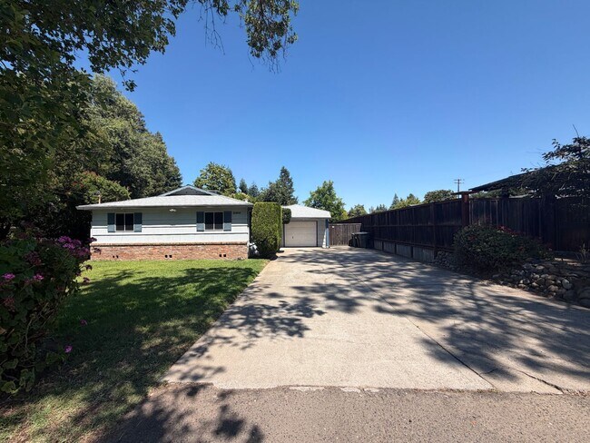 Building Photo - Adorable house with large deck,  yard and RV access