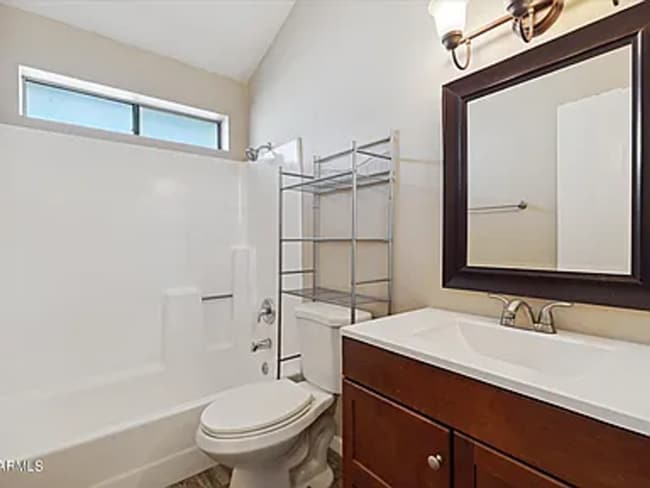 Building Photo - READY TO TOUR NOW! Charming 3-Bedroom 3-Bathroom Corner Townhouse in Peoria!