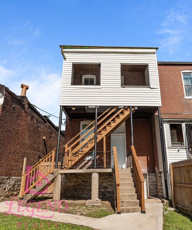 Building Photo - Completely Renovated 4BR Brick Home with 3 Full Baths & Off-Street Parking