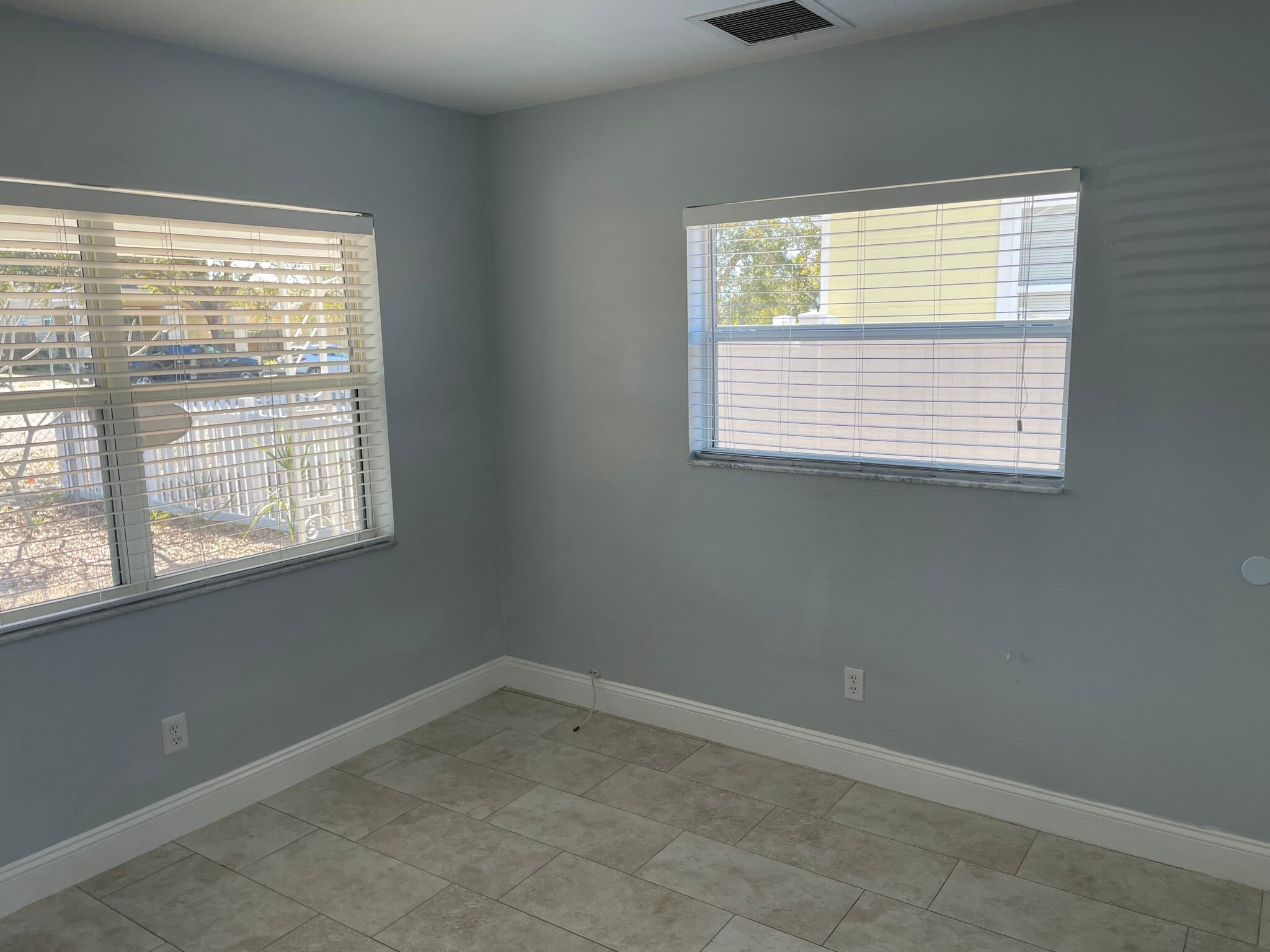 Front bedroom looking out the front and side windows. Privacy blinds throughout - 3815 1ST AVE N