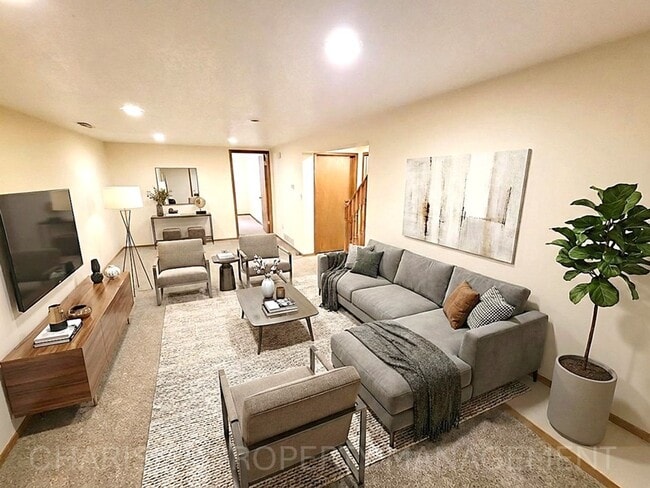 Building Photo - 4 BD, 2 BA - FENCED IN YARD, PRIVATE TRAILS, FINISHED UPPER AND LOWER LIVING AREAS, ATTACHED GARAGE!