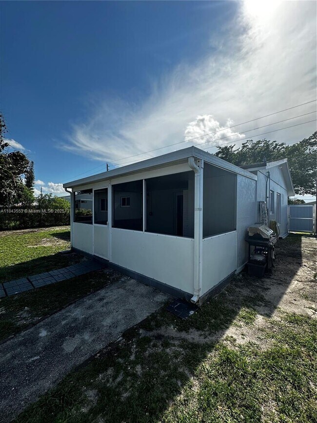 Building Photo - 18121 NW 32nd Ave