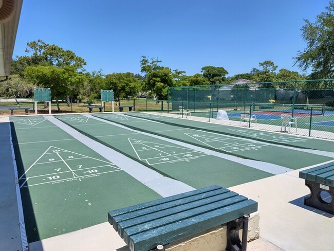 Building Photo - Bird Bay Village Annual Rental – Furnished 1st Floor Unit with Covered Parking