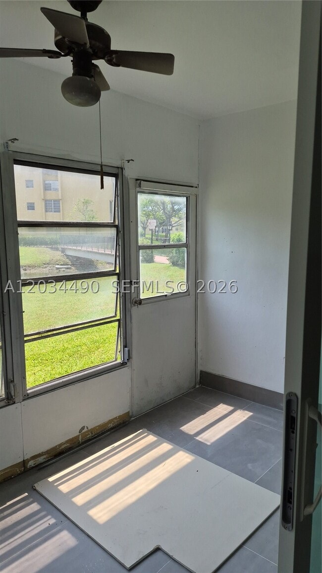 Building Photo - 6050 NW 64th Ave