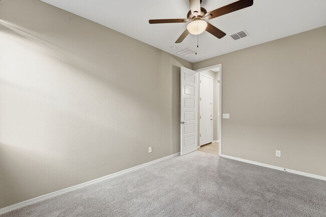 Building Photo - Stunning 4-Bed + Den Eastmark Home with Modern Upgrades Throughout