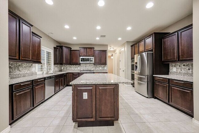 Building Photo - COMING SOON! Great Location!Stunning 6-bedroom Plus 7, 4.5-bathroom home located in Chandler