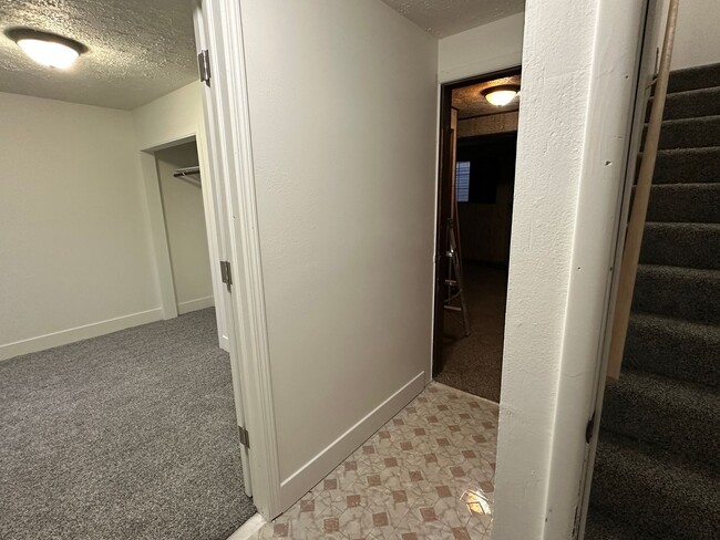 Building Photo - Spacious, three level, 4 Bed 2.5 bath Townhome in Ammon right behind the Walmart on Hitt.