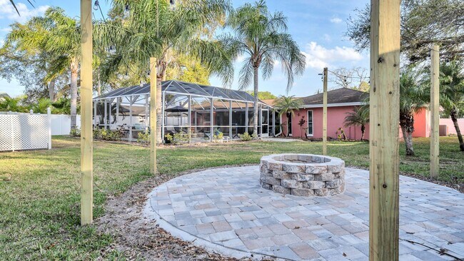Building Photo - Luxurious FURNISHED 4BR/3BA Pool Home with...