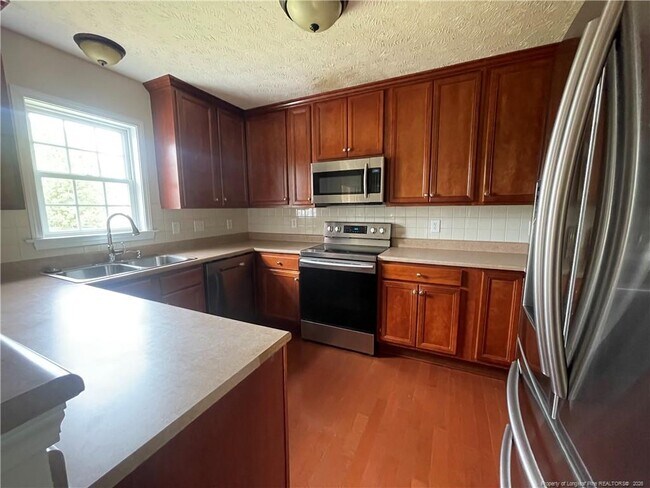 Building Photo - 8240 Frenchorn Ln