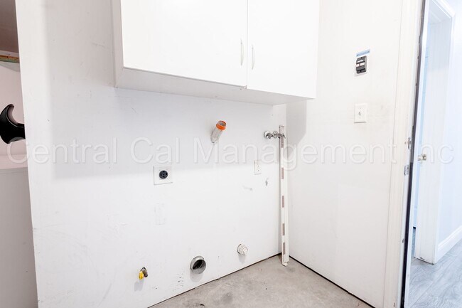 Building Photo - 3 Bedroom/2 Bath with a Pool and Solar - $...