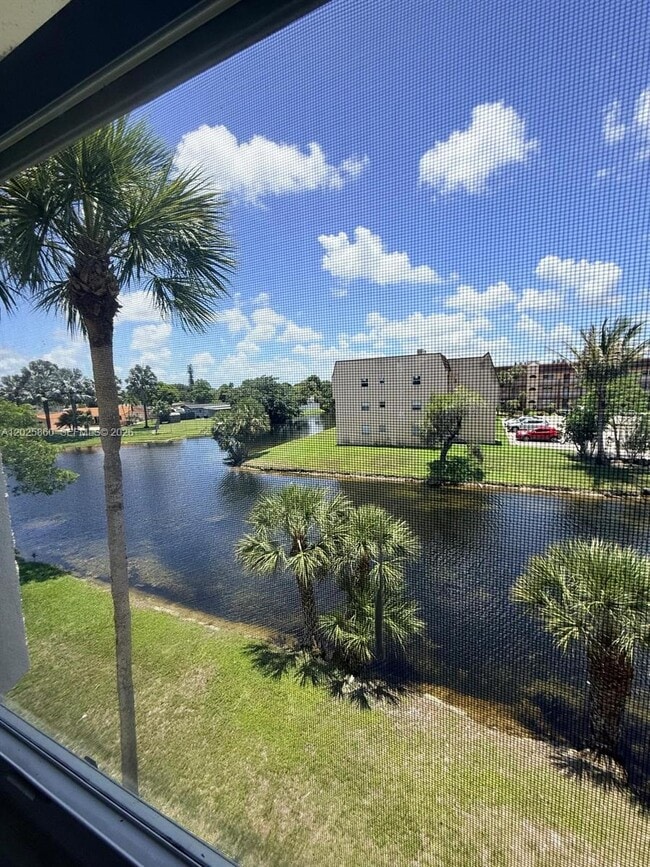 Building Photo - 8595 Sunrise Lakes Blvd