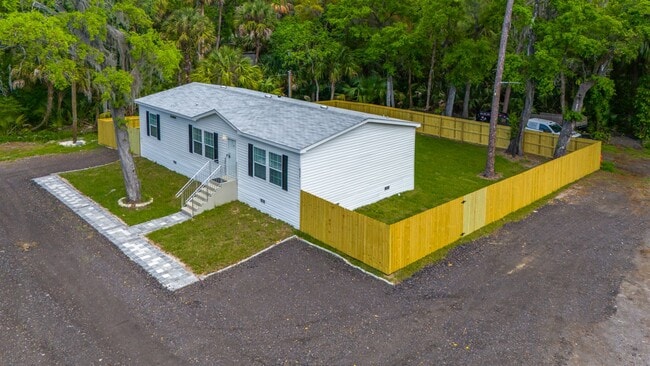 Building Photo - Experience exceptional living at its finest