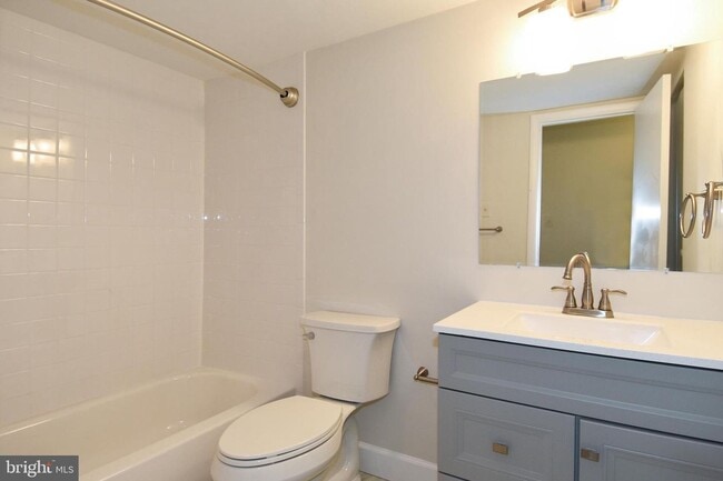 Building Photo - Commuter friendly location has easy access to I495 & Route 50. Metro bus stop in community.