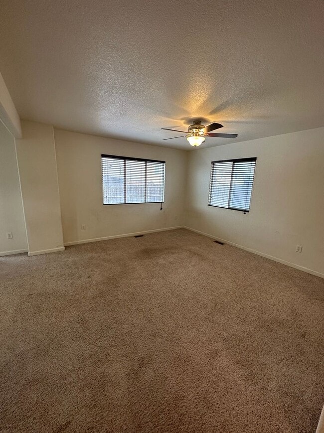 Building Photo - 3 BEDROOM, 2.5 BATHROOM TWINHOME WITH 2 CAR ATTACHED GARAGE