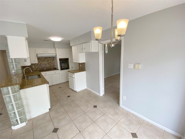 Building Photo - 8214 Riptide Dr