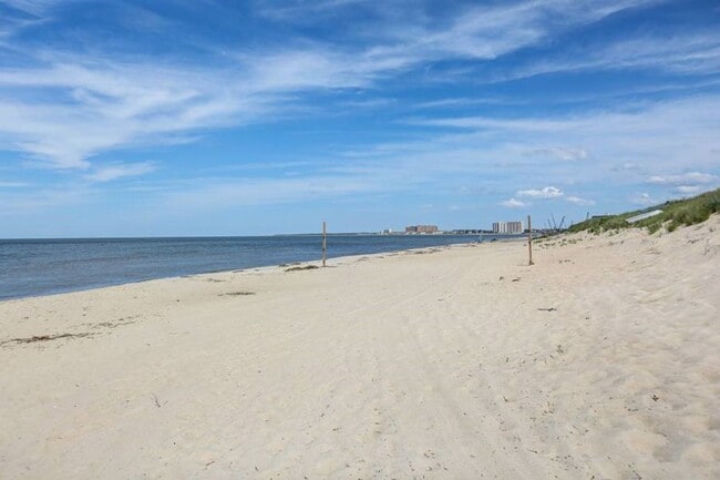 Building Photo - 3-Story Duplex in Chesapeake Beach! Ready 05-06-26! Fenced Backyard - Attached Garage - Pet Frien...