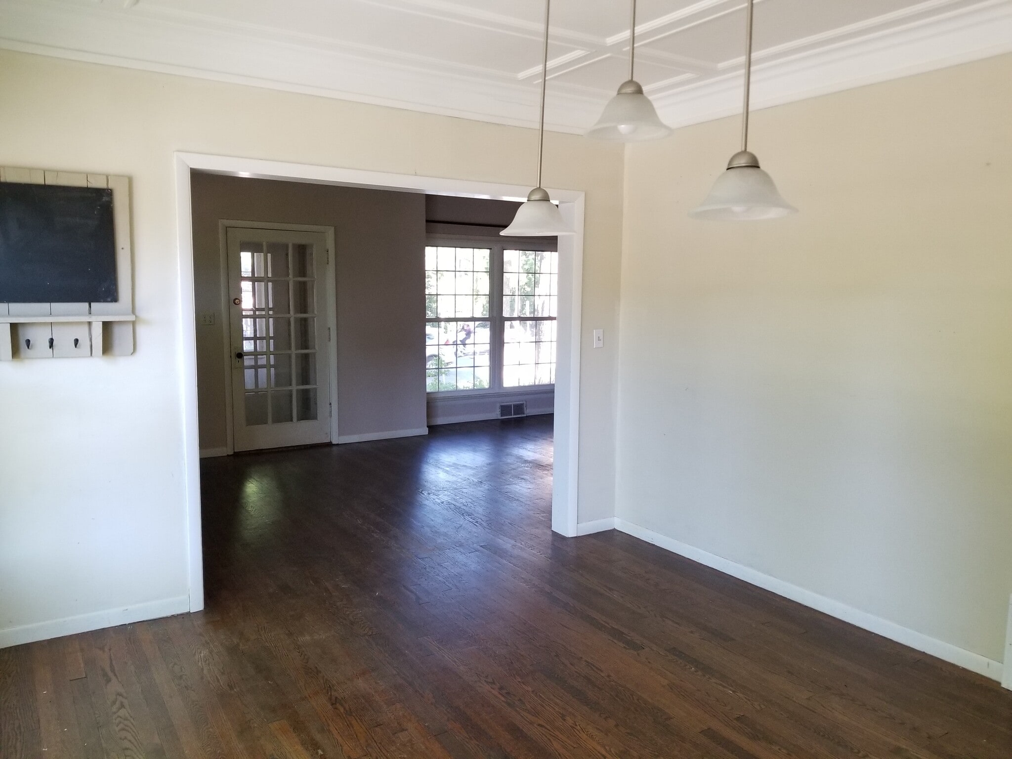 Dining Room to Windowed Porch - 3285 N Cramer St