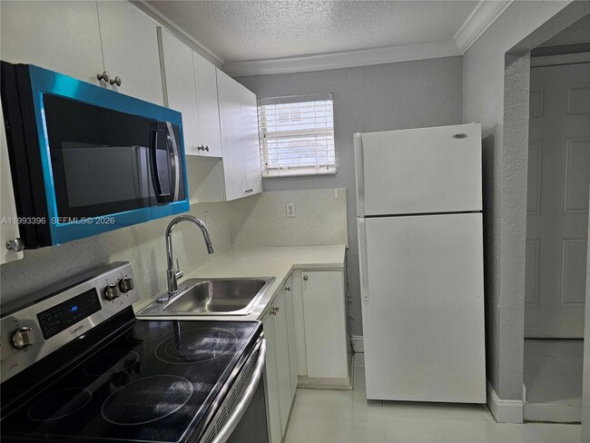 Building Photo - 8027 NW 8th St