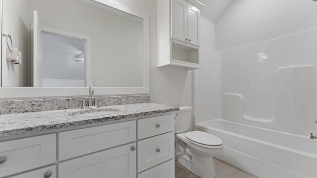 Building Photo - "Lovely 4-Bedroom Retreat with Fireplace &...