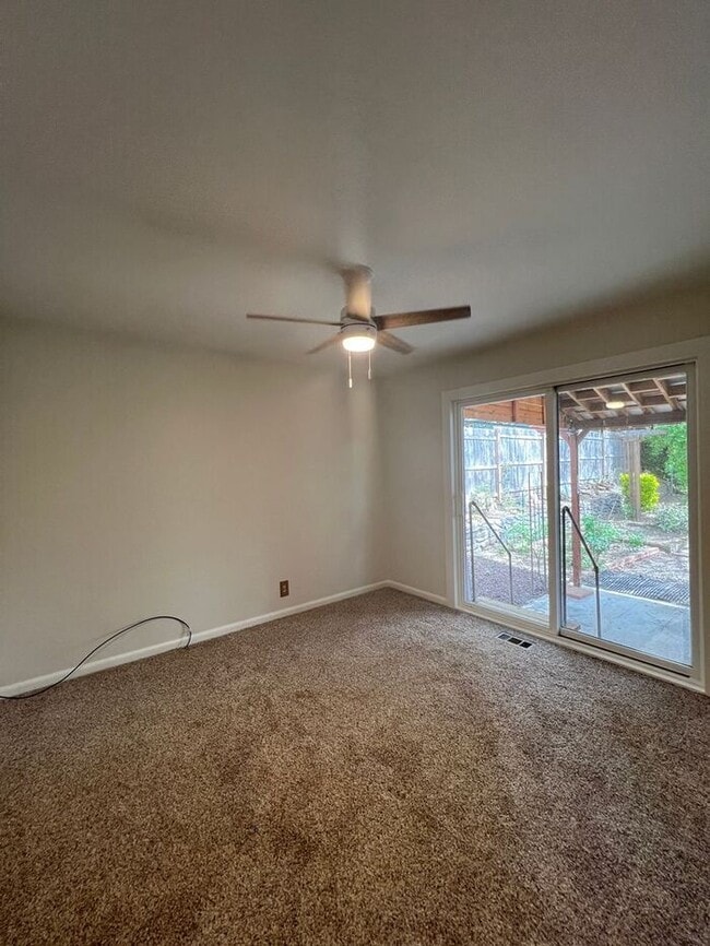 Building Photo - Professional Photos Coming Soon | Your Mt. Tabor Oasis: Huge Yard, Oversized Shop-Garage & Sun-Dr...