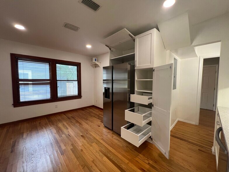 Pull Out Soft Close Pantry Cabinets and Overhead Deep Horizontal Storage - 3880 Walsh St