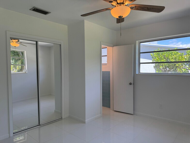 Another view of master bedroom with half bath - 11535 SW 81st Rd
