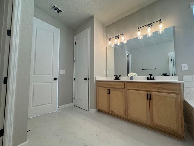 Building Photo - Where Modern Comfort Meets 4BD/3BA Hometown Charm — Your Story Begins in Okahumpka! FULLY-FENCED!...