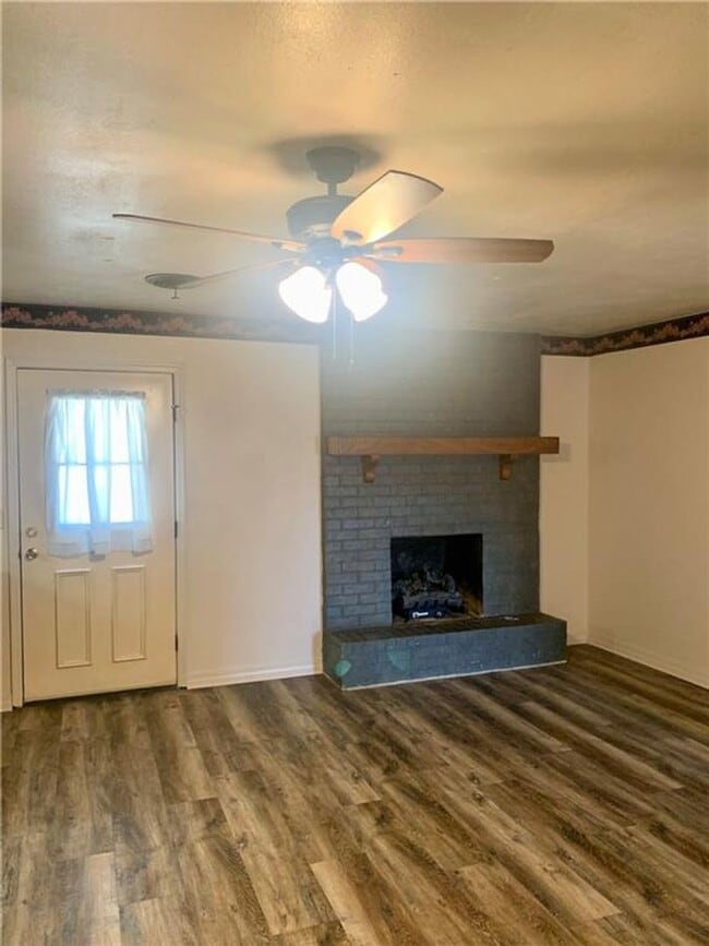 Building Photo - Charming Home with Open Kitchen, Fireplace & 2-Car Garage