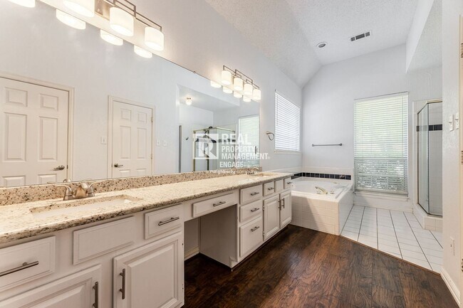 Building Photo - Recently Updated Plano Property with Modern Features and Serene Surroundings