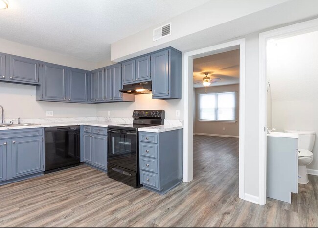 Building Photo - Beautifully Renovated 2 Bedroom Townhomes ...