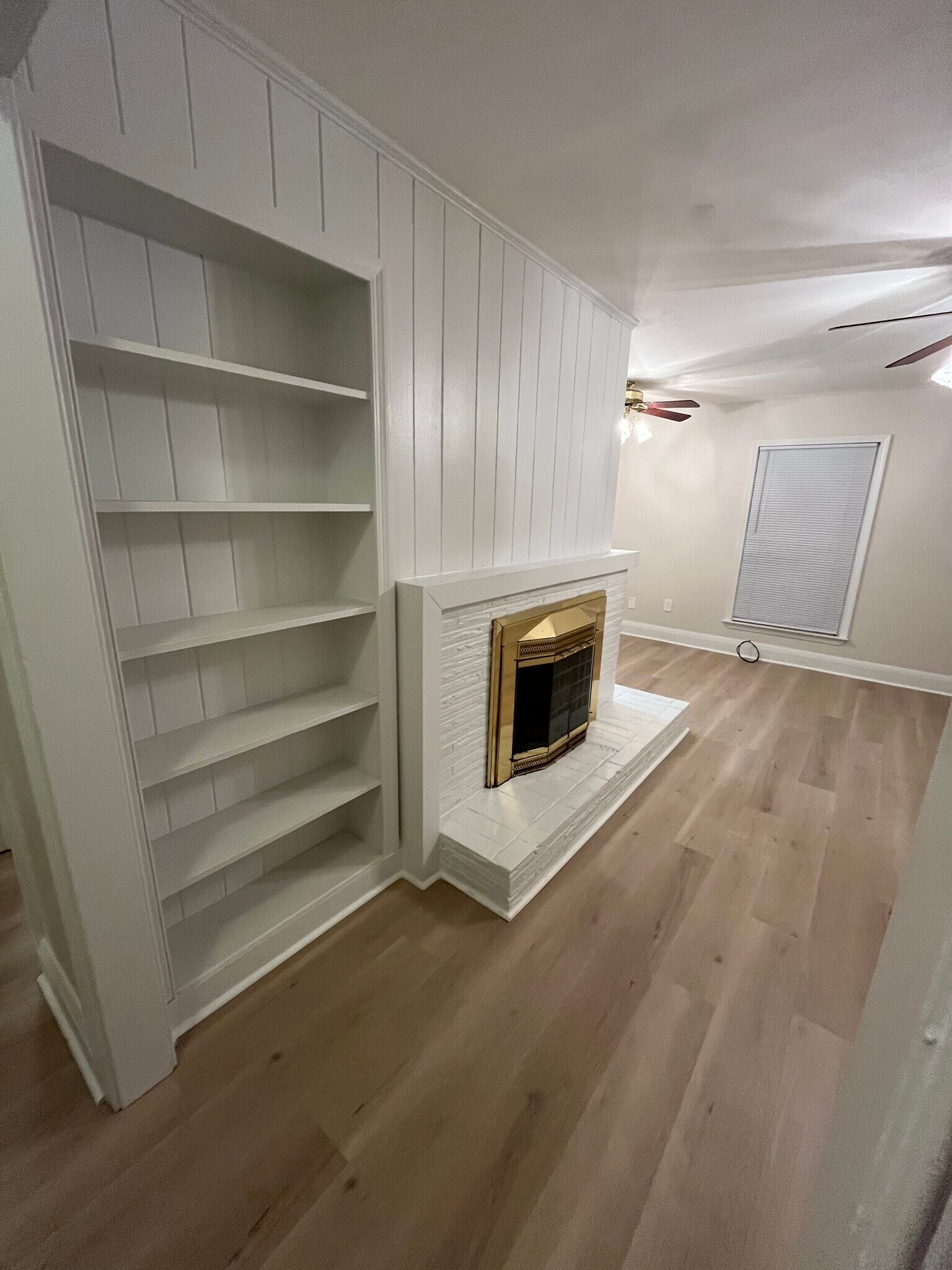 Living room and non-operating fireplace - 13400 Oakwood Drive