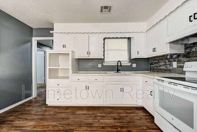 Building Photo - 8616 N Harvey Ave